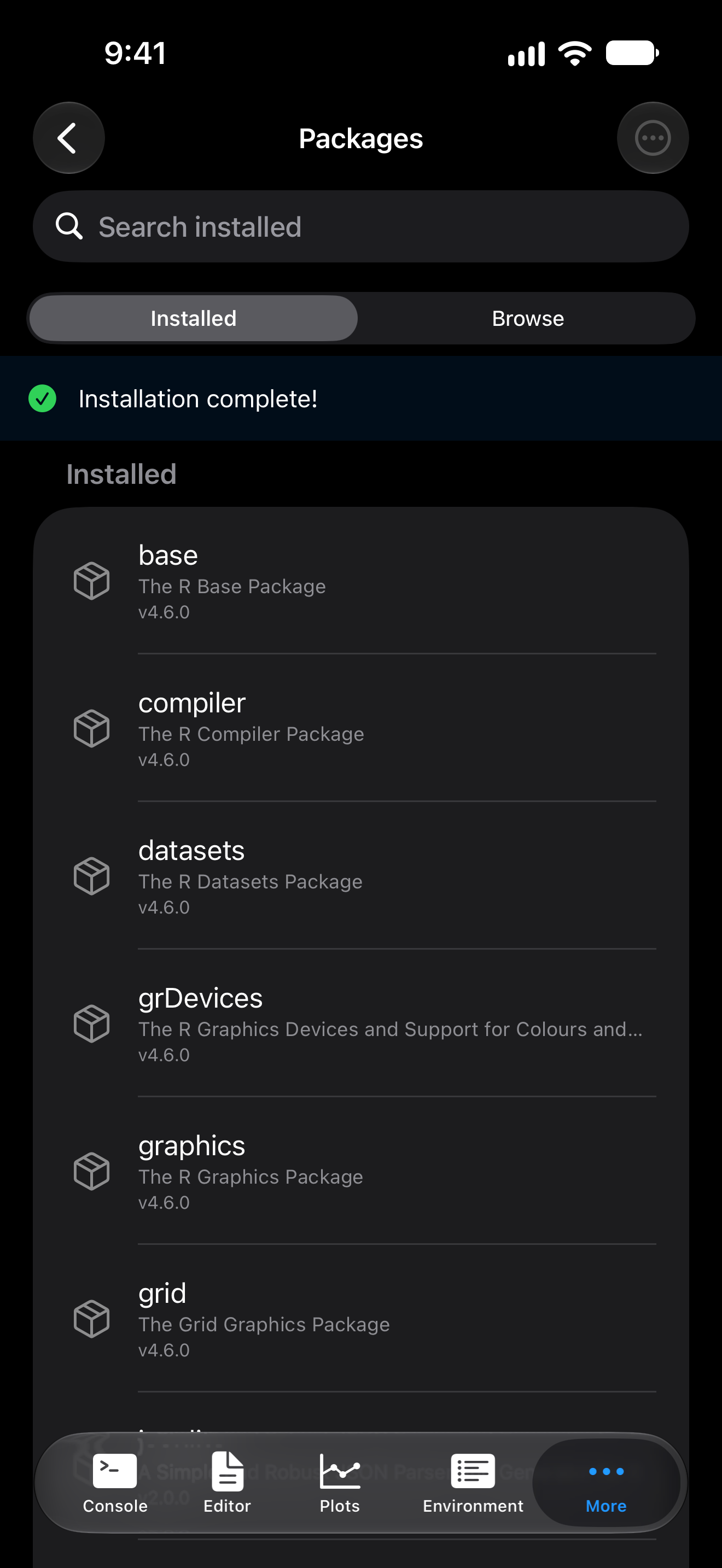 Packages tab on iPhone with the banner reading Installation complete! beside a green checkmark in dark mode