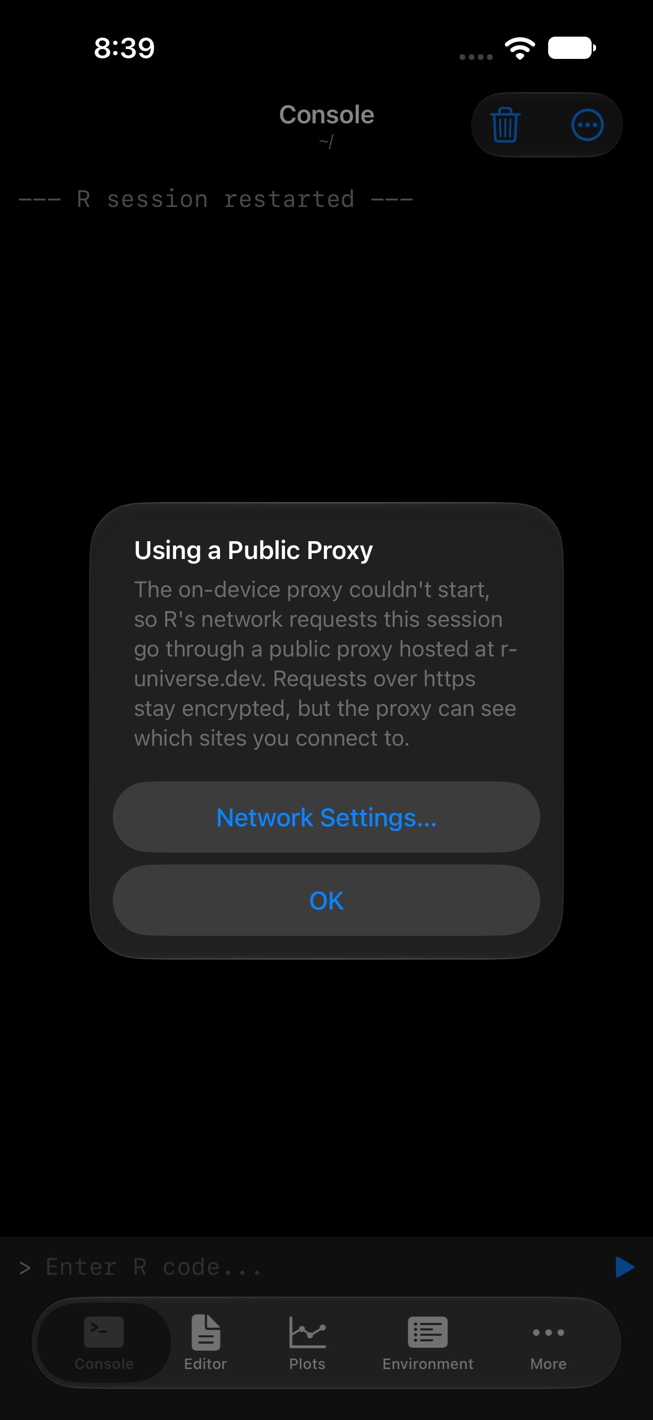 Alert on iPhone titled Using a Public Proxy explaining that requests go through a proxy hosted at r-universe.dev, in dark mode
